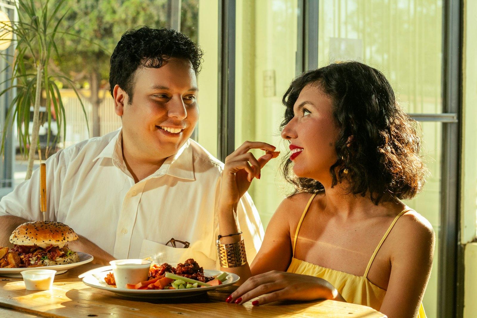 Couple laughing over dinner